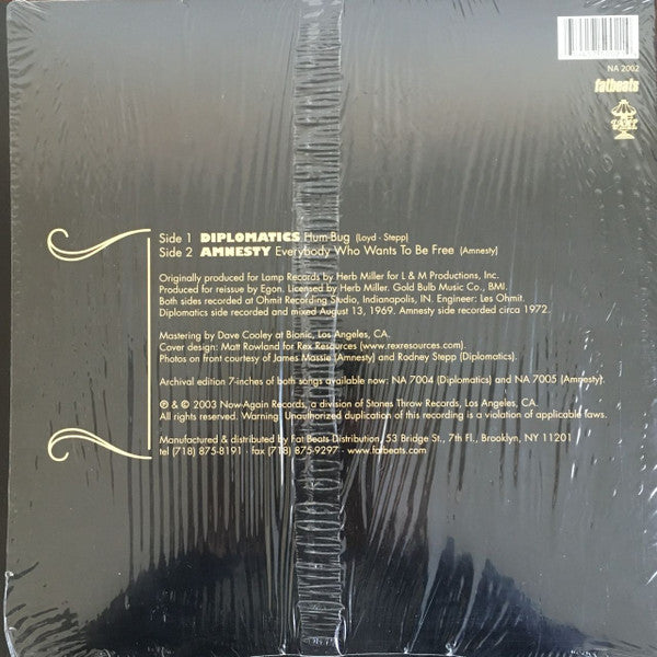 Diplomatics / Amnesty - Hum-Bug b/w Everybody Who Wants To Be Free (12", Single)
